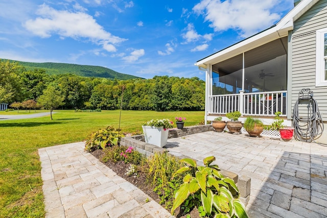 view of patio with ceiling fan