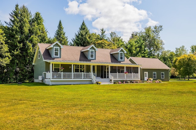 cape cod-style house featuring a porch and a front yard