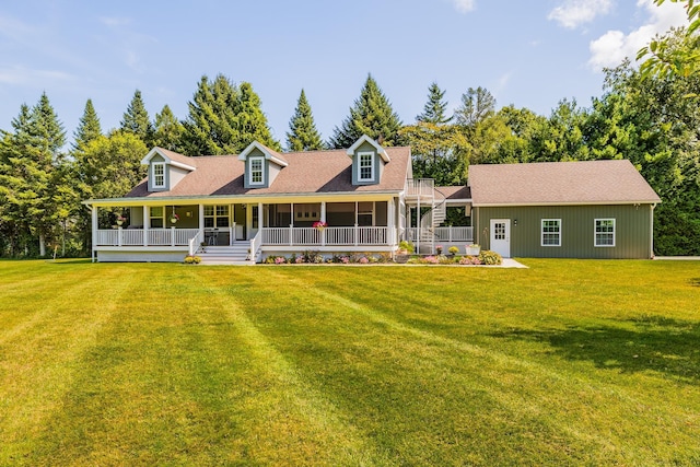 view of front of home featuring covered porch and a front lawn