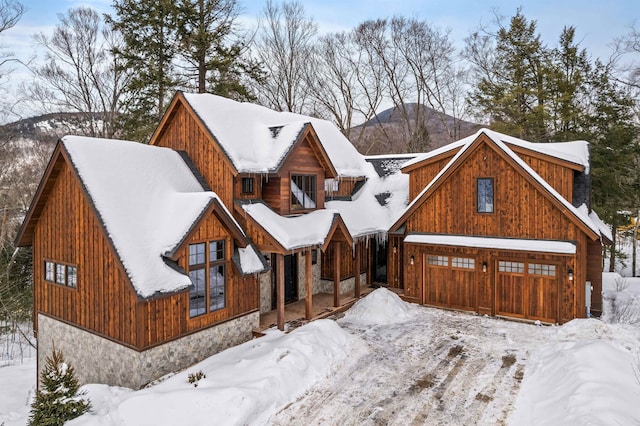 view of front of property with a mountain view