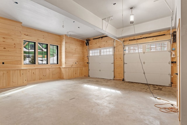 garage with wood walls