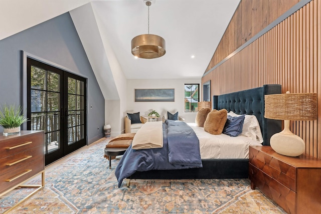 bedroom with french doors, vaulted ceiling, and access to outside