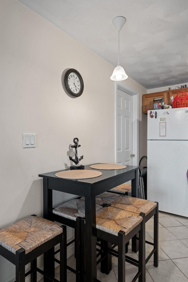 view of tiled dining room