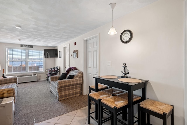 dining room with light colored carpet