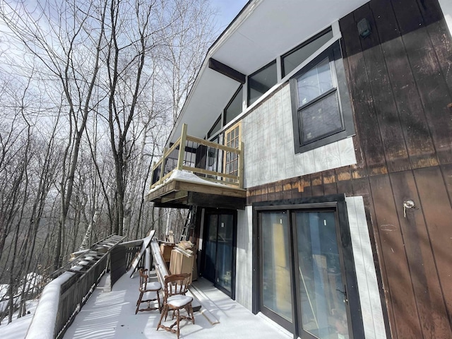 view of snow covered deck