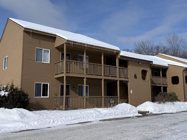 view of snow covered property