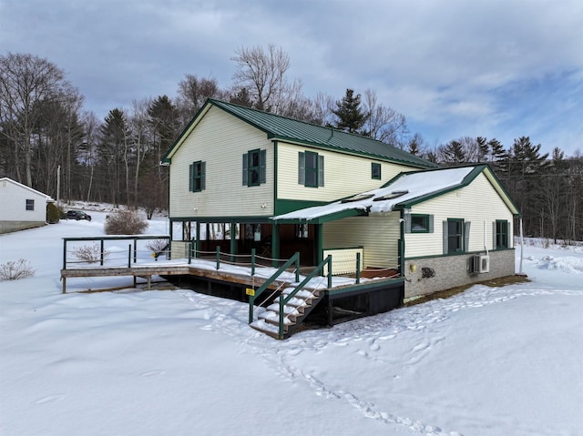 view of front of property featuring a deck