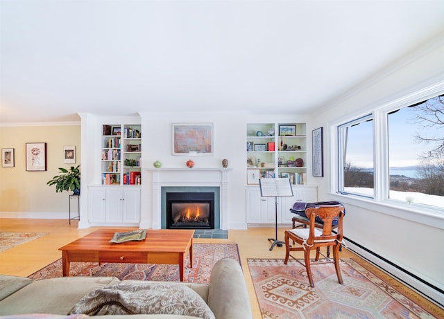 living room with light wood-type flooring, ornamental molding, and baseboard heating