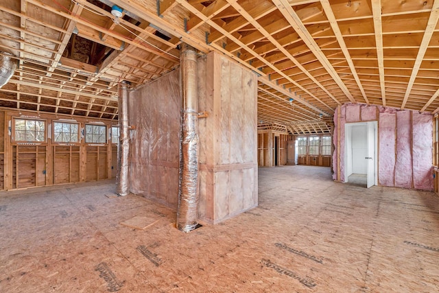 miscellaneous room featuring lofted ceiling