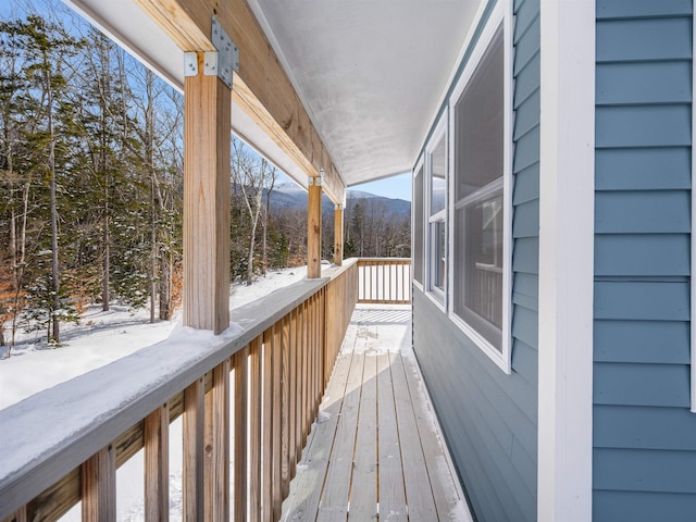 view of snow covered deck