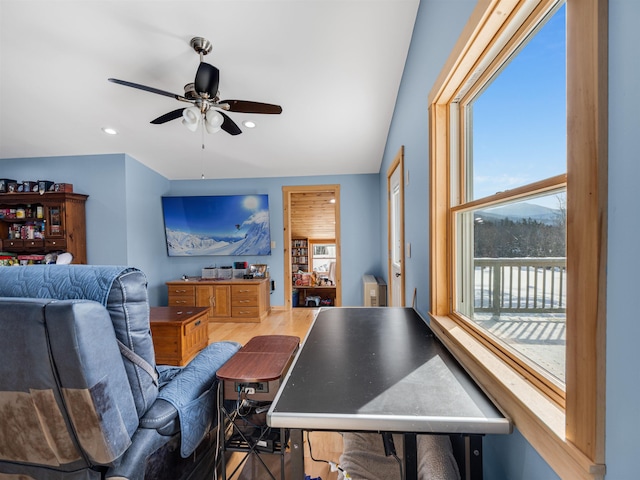 living room featuring ceiling fan