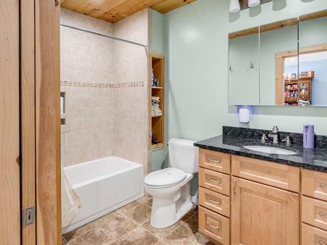 full bathroom featuring toilet, vanity, tiled shower / bath, and wood ceiling