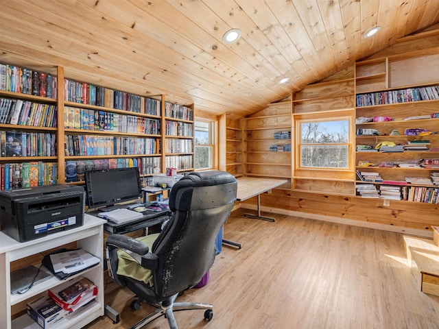 office area with light hardwood / wood-style flooring, wood walls, wooden ceiling, and vaulted ceiling