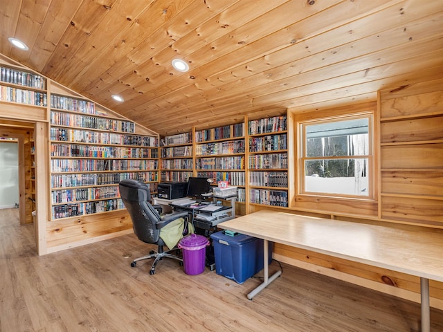 office with light hardwood / wood-style floors, wood ceiling, vaulted ceiling, and built in features