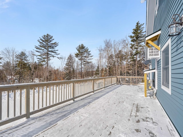 view of snow covered deck