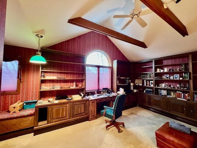 office space with vaulted ceiling with beams, built in features, and ceiling fan