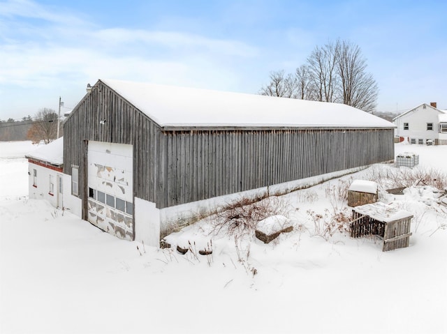 view of snow covered garage