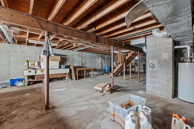 basement featuring gas water heater