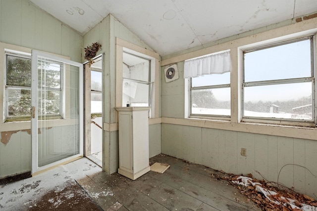 unfurnished sunroom with vaulted ceiling