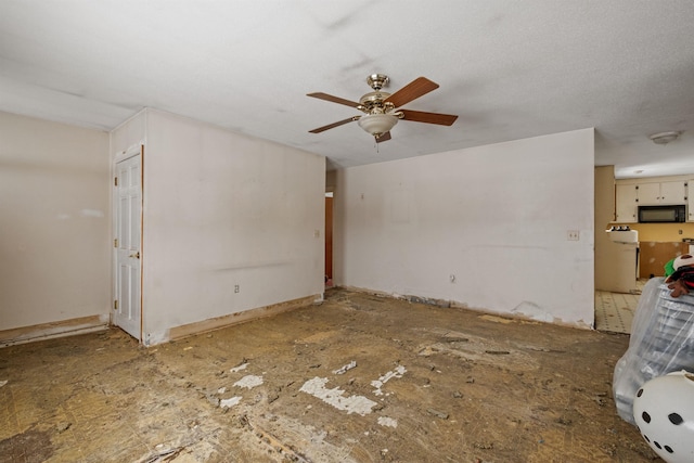 unfurnished living room with ceiling fan