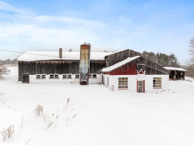 view of snow covered house