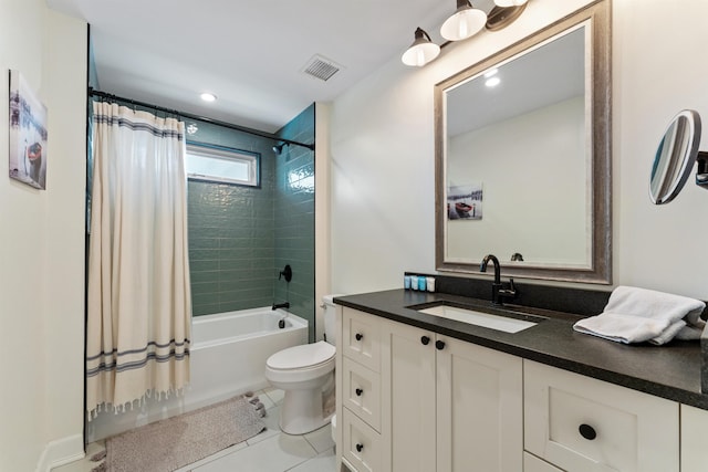 full bathroom with shower / bath combo, vanity, tile patterned floors, and toilet