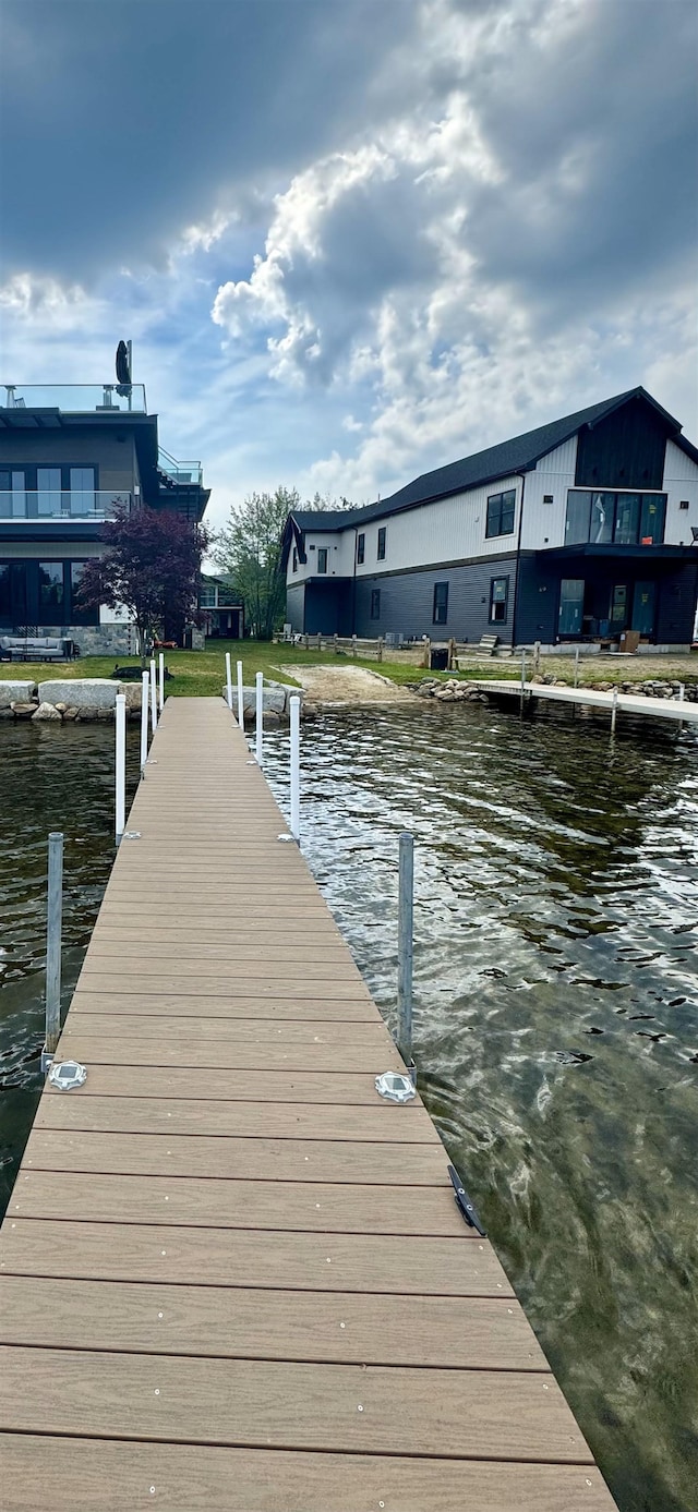 view of dock with a water view