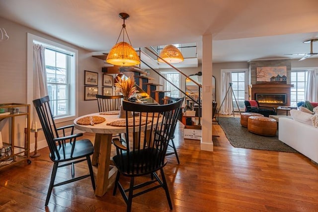 dining space featuring hardwood / wood-style floors