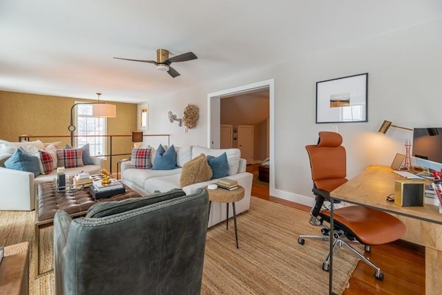 living room with ceiling fan and light wood-type flooring