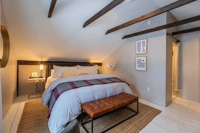 bedroom with vaulted ceiling with beams