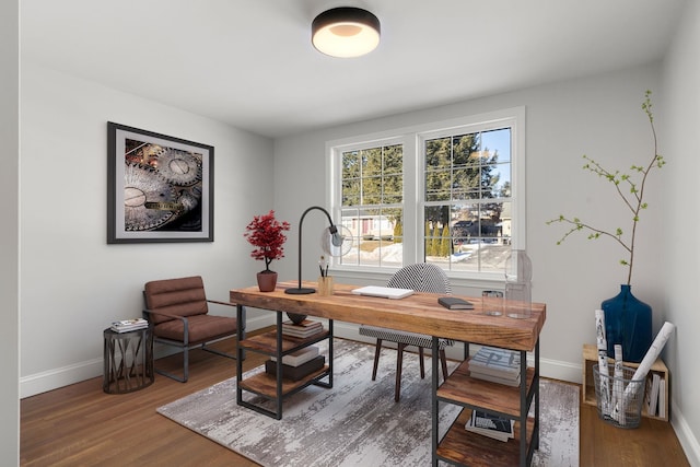 office space with hardwood / wood-style flooring