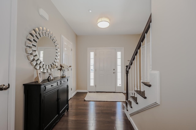 foyer entrance featuring dark hardwood / wood-style floors