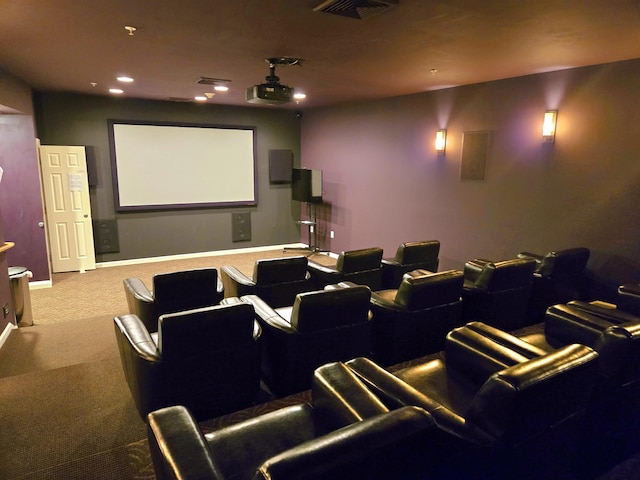 home theater room featuring light colored carpet