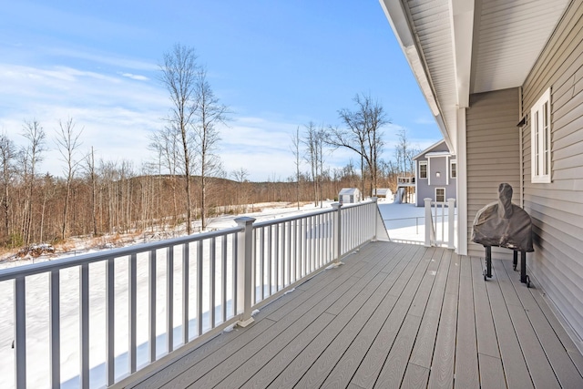 view of snow covered deck