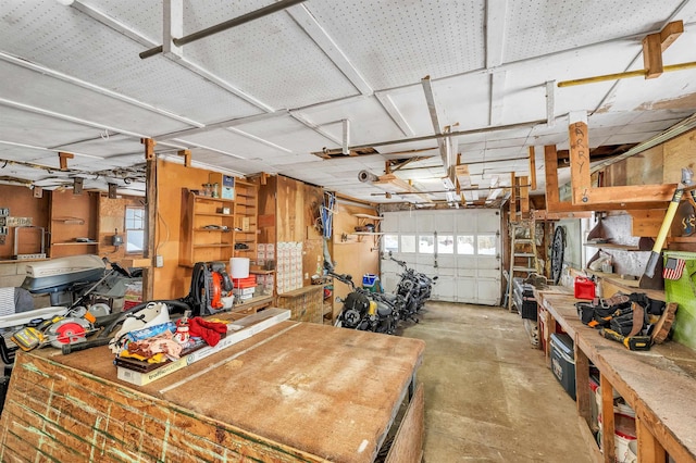 garage with a workshop area