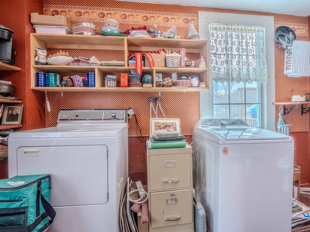 washroom with washing machine and dryer