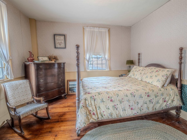 bedroom featuring wood-type flooring