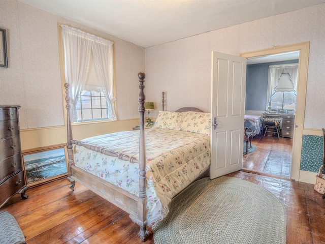 bedroom featuring hardwood / wood-style floors