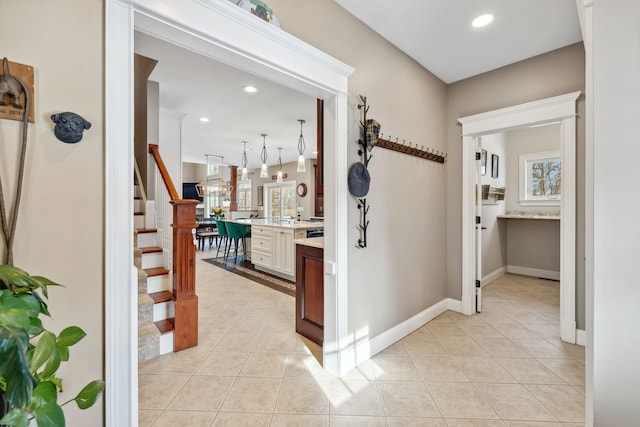 hallway with light tile patterned flooring