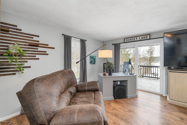 living room featuring light wood-type flooring