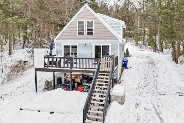 view of front of home featuring a wooden deck