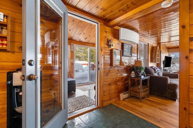 entryway with wooden walls, wood ceiling, wood finished floors, a wall mounted air conditioner, and baseboard heating