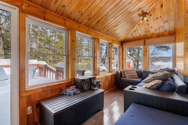 sunroom / solarium with lofted ceiling and wooden ceiling