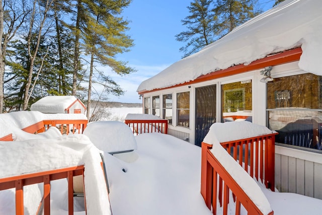 view of snow covered deck