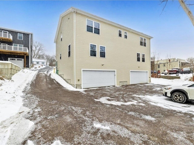 exterior space with a garage