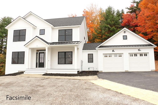 modern farmhouse style home with a garage