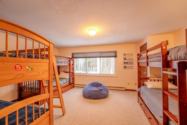 carpeted bedroom with a baseboard radiator and a textured ceiling