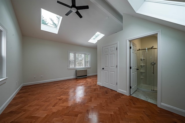 additional living space featuring parquet flooring, ceiling fan, and lofted ceiling with beams