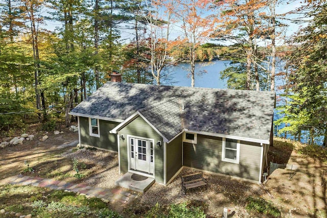 view of front of home featuring a water view