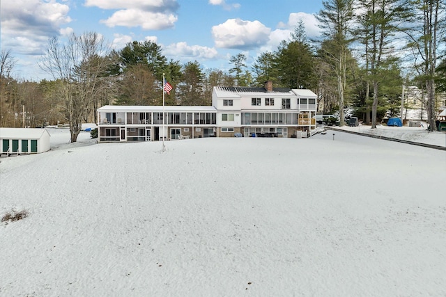 view of snow covered property